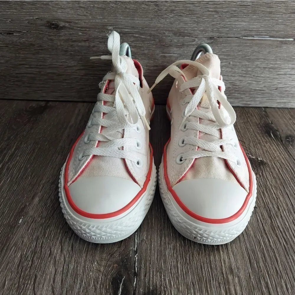 Converse sneakers off